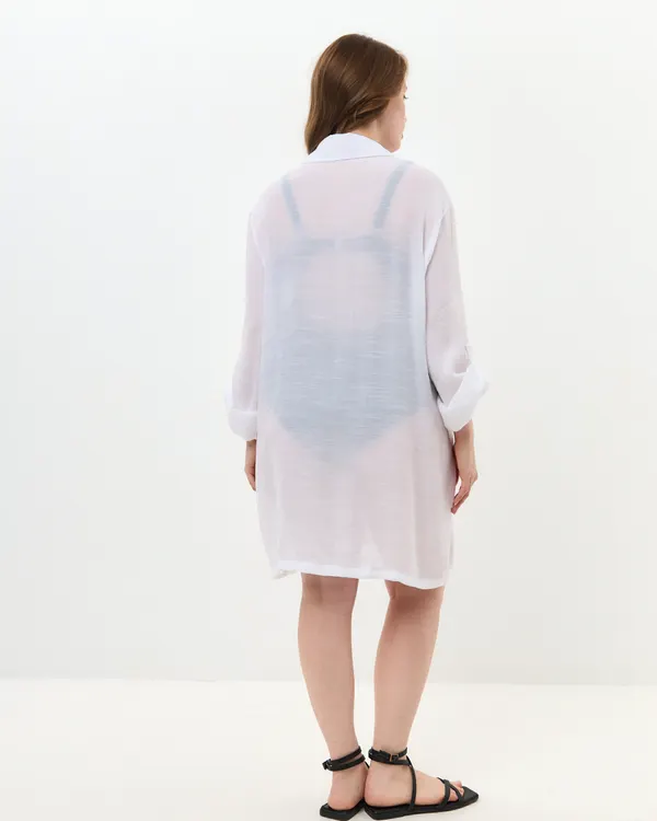 White beach cover shirt, back view