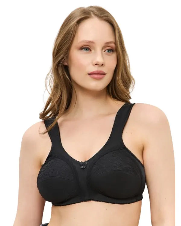 Woman wearing the black lace mastectomy bra, front view