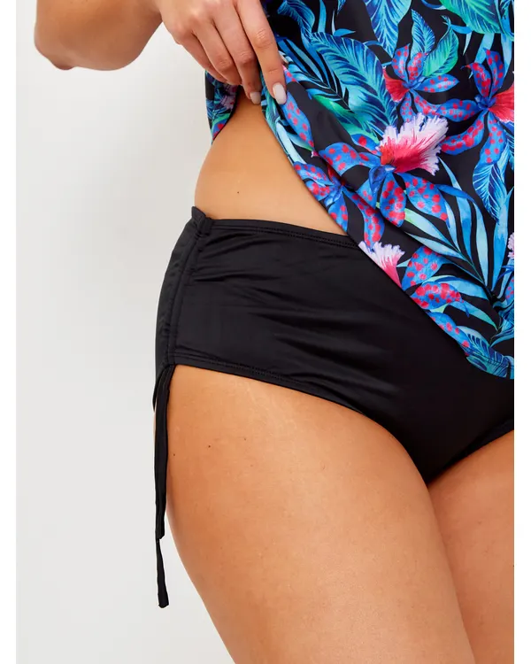 Close-up of the black Vera tankini bottom with its side tie